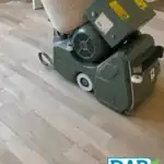 Lagler Hummel belt sander in use during dust-free wood floor sanding in Huddersfield.