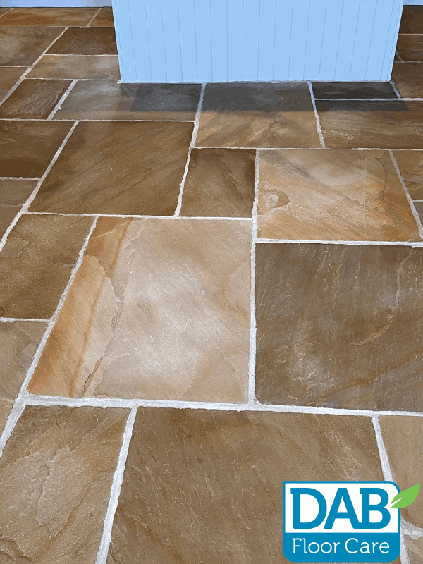 Clean, polished stone floor tiles.