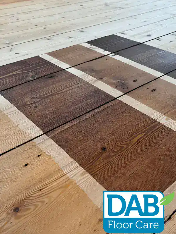 Wood stain samples on wooden floor