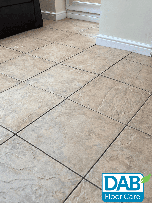 Clean tiled floor in a hallway.