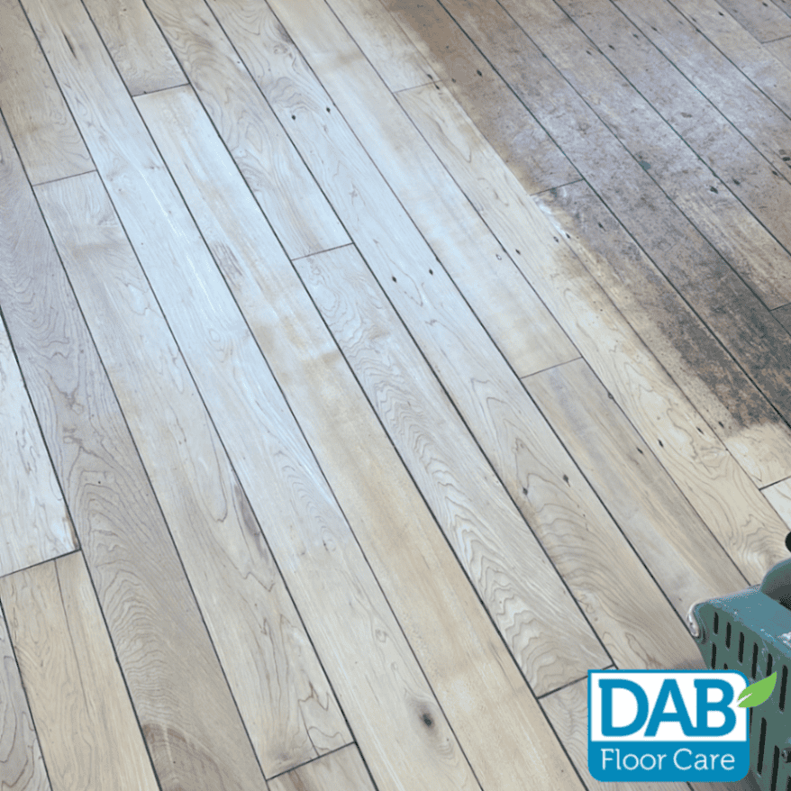 Wooden floor restoration equipment visible.